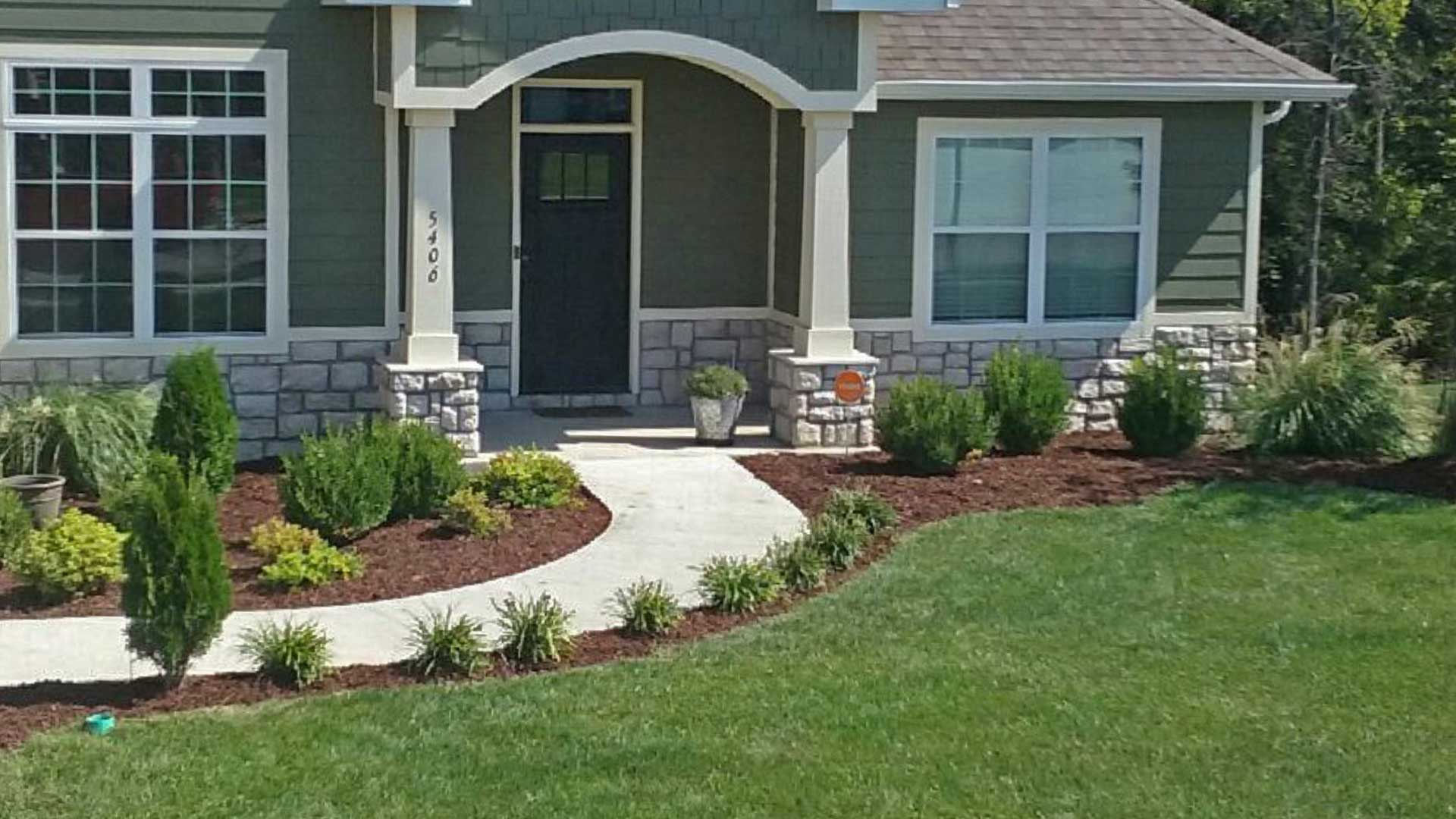 Columbia, MO Home with New landscaping and lawn maintenance by McVey Mowing.