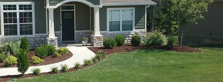 Columbia, MO home with new landscaping in the front by McVey Mowing.